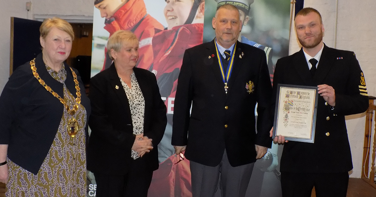 Mayor Bambridge and representatives of the Royal British Legion, who awarded King's Lynn Sea Cadets the Roe Youth Cup, accepted by Petty Officer Kurt Massen