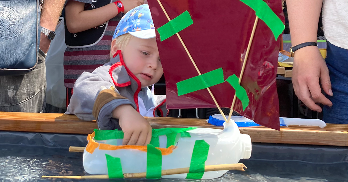 WEB Aiden launching his boat WEB Aiden launching his boat
