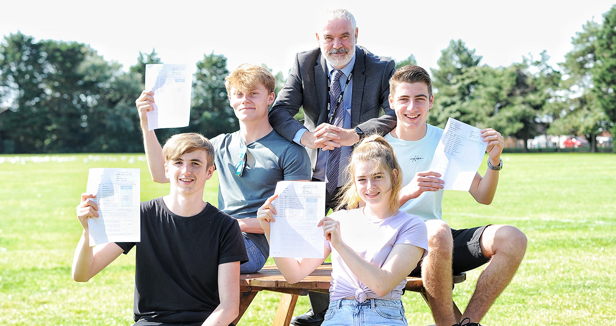 WEB John Hirst (head) with top performing students WEB John Hirst (head) with top performing students