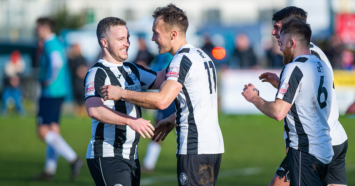 WEB San Mulready congratulates Toby Hilliard (right) on his opening goal