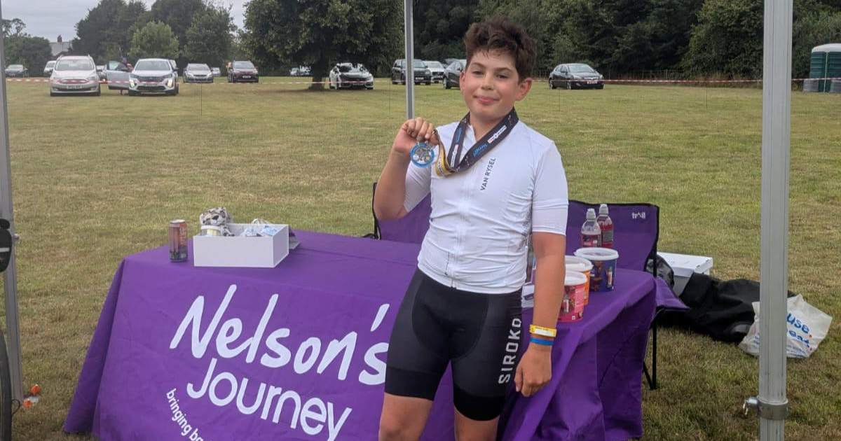 12 year old cycles a 100 miles in memory of his mum and raises thousands for Norfolk charity