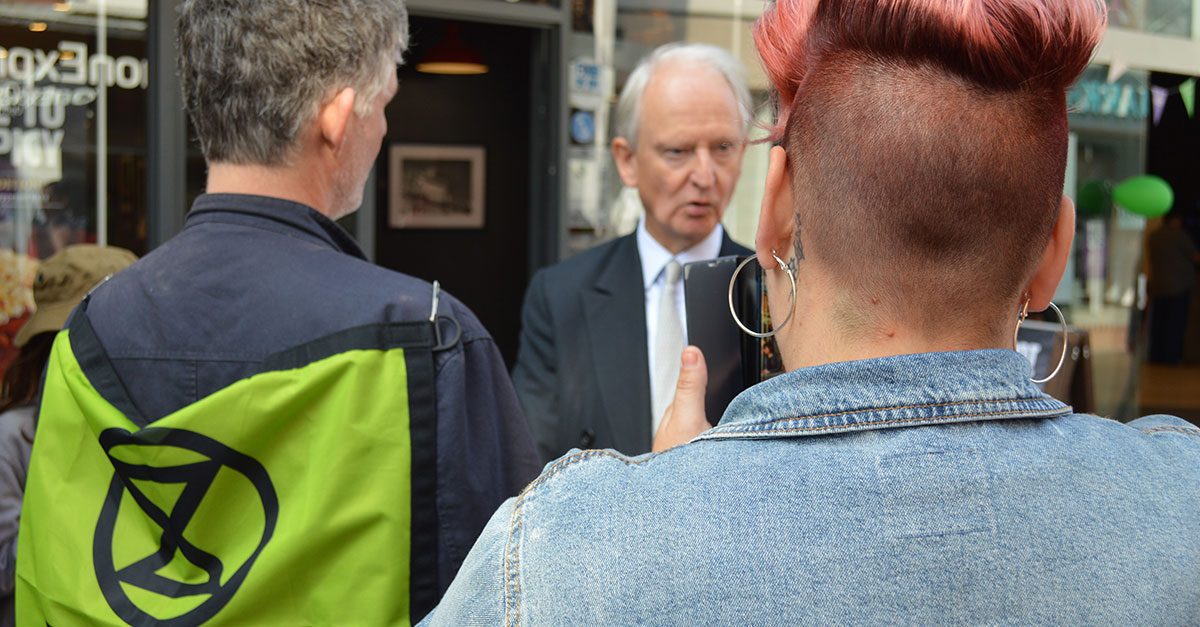 Sir Henry Bellingham meets climate change protesters