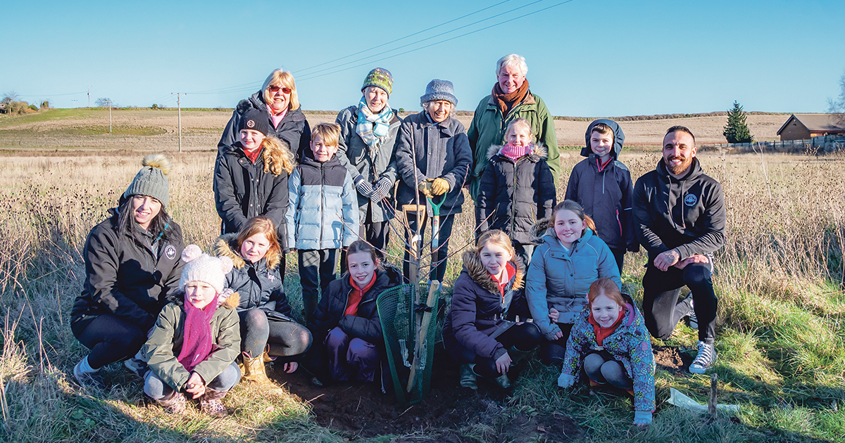 Local Parish Council make roadside greener with help from Ingoldisthorpe Primary School