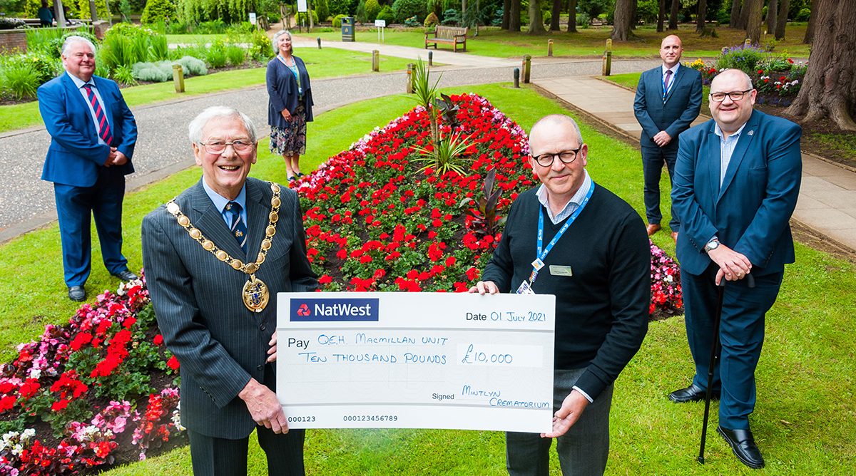 £10,000 donation to QEH Macmillan Cancer Care from Mintlyn Crematorium