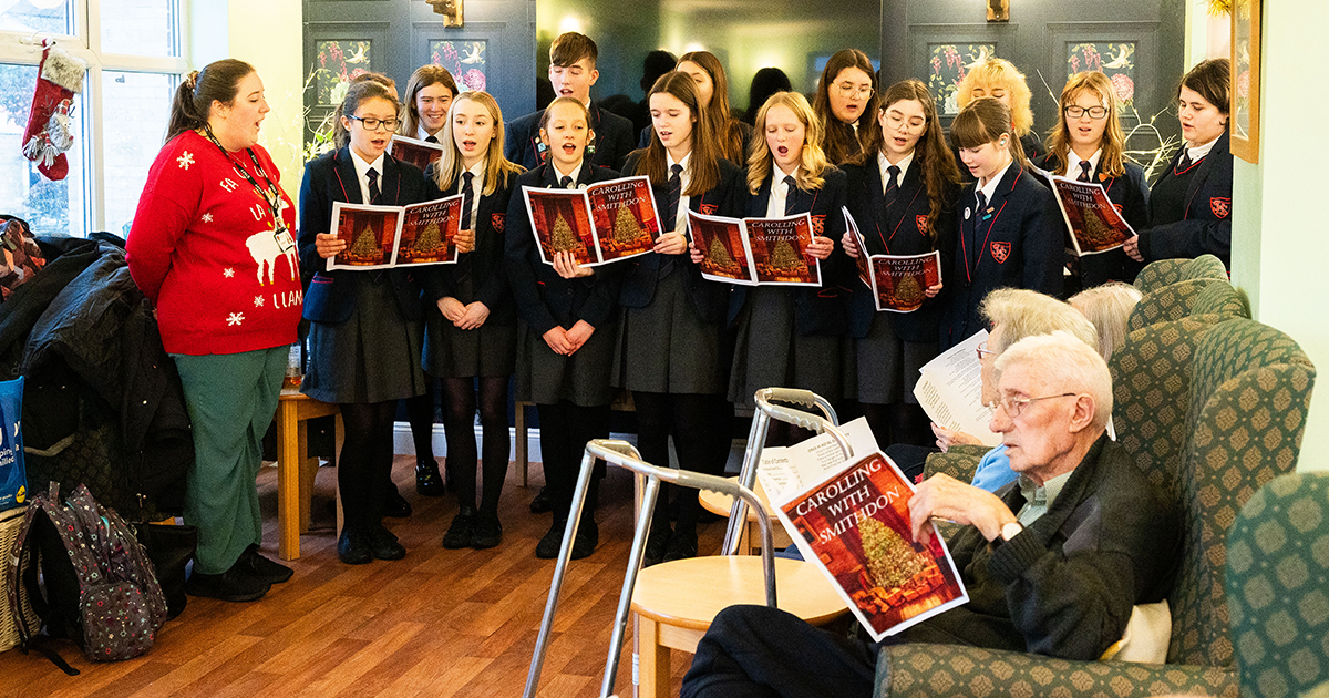 Students sing carols in care homes