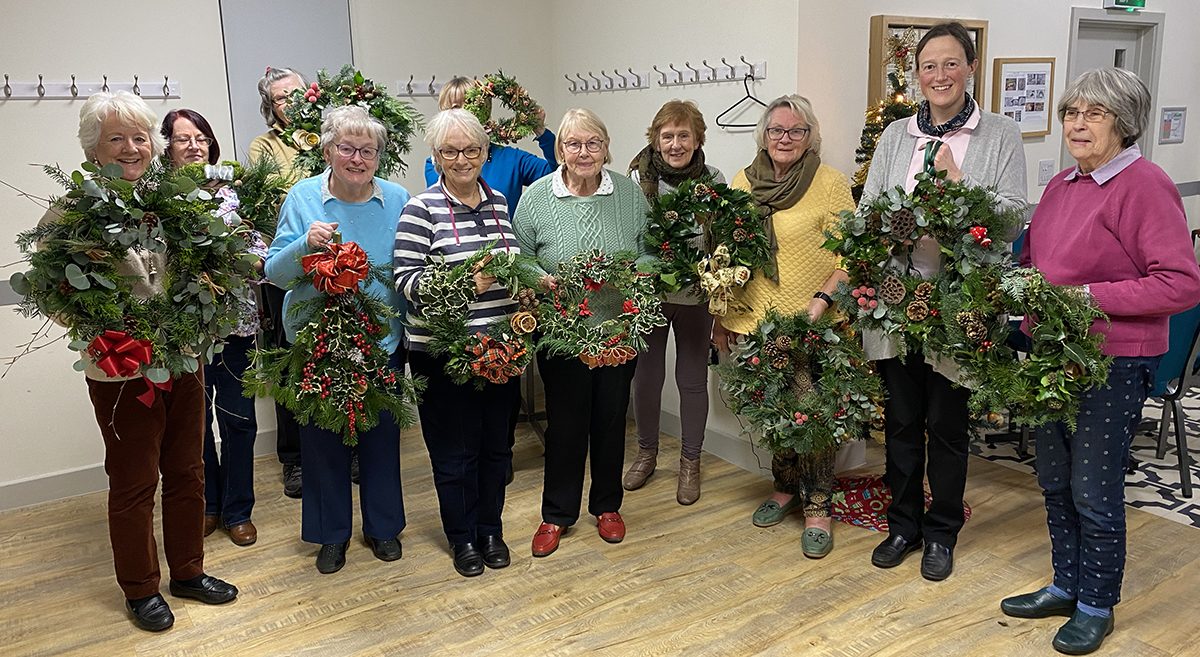 Dersingham flower arrangers deck the doors