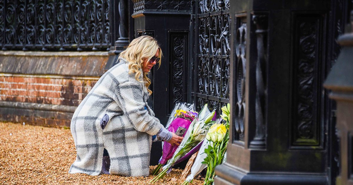 Floral tributes laid by the gates at Sandringham