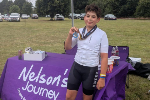 12 year old cycles a 100 miles in memory of his mum and raises thousands for Norfolk charity