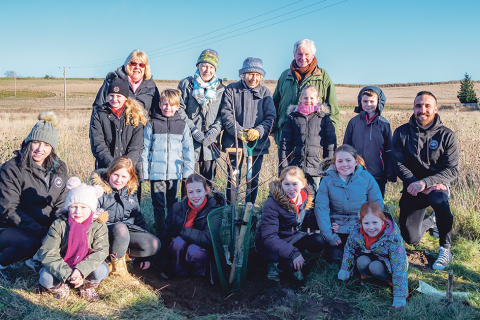 Local Parish Council make roadside greener with help from Ingoldisthorpe Primary School