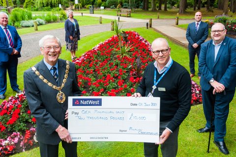 £10,000 donation to QEH Macmillan Cancer Care from Mintlyn Crematorium