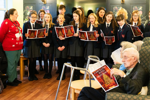 Students sing carols in care homes