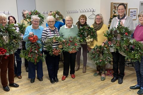 Dersingham flower arrangers deck the doors