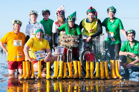 Swimmers brave the icy waters of the Wash on Christmas Day